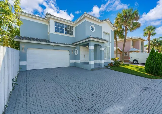 Photo 2 of Single family home for sale at 4450 Nw 55th Drive, Coconut Creek, FL 33073 | MLS# B26005463 | Listing updated on 2026-10-03