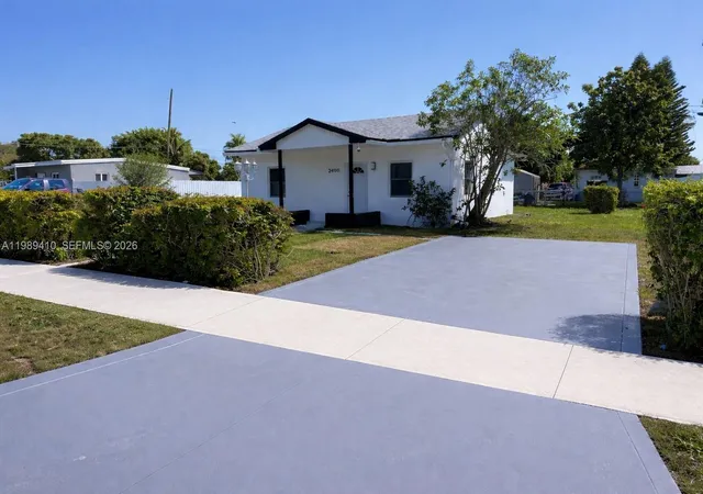 Single family home for sale at 2450 NW 157th Street Rd, Opa Locka, FL 33054 | MLS# A11989410 | Listing updated on 2026-08-04