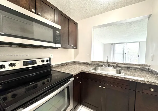 1st image of 484 Nw 165Th St Rd #A411, Miami, FL 33169 | MLS# A11975880
