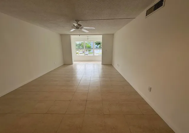 Listing Photo 1 - Condo for sale in building located at 2850 Somerset Dr, Lauderdale Lakes, FL 33311 - Unit #208l
