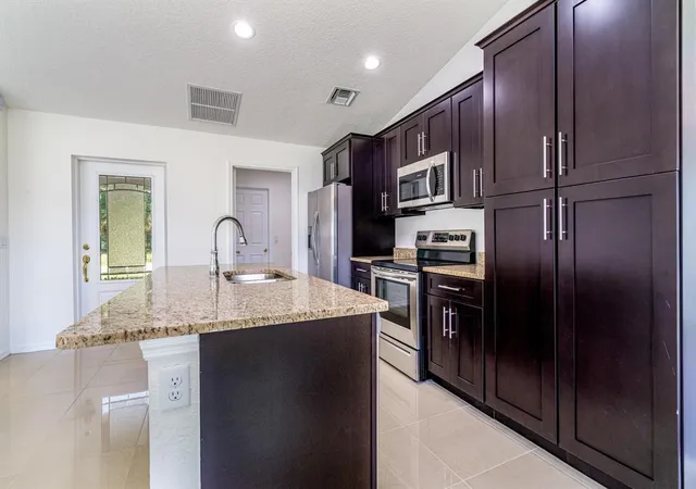 5th image of 986 Sw Romaine Ln, Port Saint Lucie, FL 34953 | MLS# B26012582