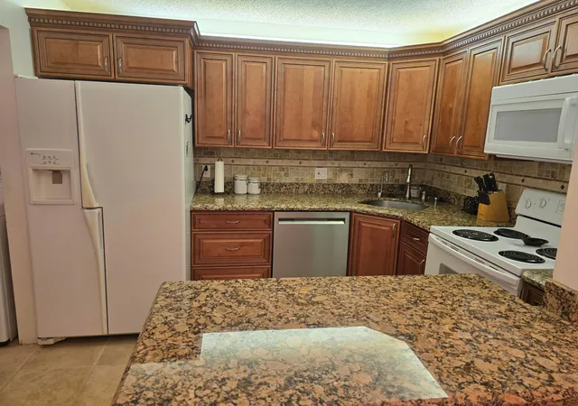 Photo 2 of Condo for sale at 317 Pine Ridge Cir #A-1, Greenacres, FL 33463 | MLS# B26013101 | Listing updated on 2026-09-23