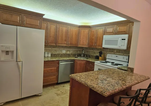 Photo 3 of Condo for sale at 317 Pine Ridge Cir #A-1, Greenacres, FL 33463 | MLS# B26013101 | Listing updated on 2026-09-23