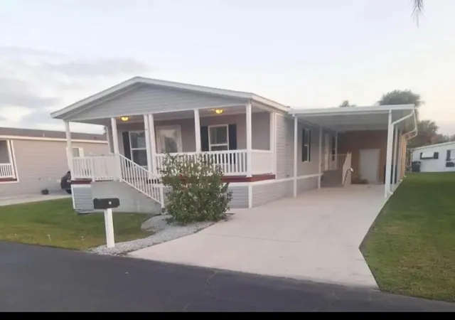 Photo 2 of Manufactured home for sale at 76 Sandhill Blvd, Fort Pierce, FL 34982 | MLS# B26013351 | Listing updated on 2026-09-23