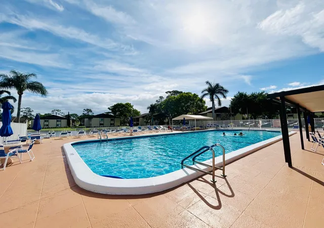 Homes for sale in Greenacres, FL | 140 Lake Pine Circle, Greenacres, FL 33463 | Houzeo
