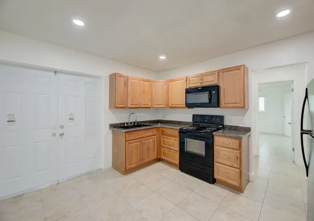 Photo 3 of Multi family home for sale at 7546 Nw 44th Court, Coral Springs, FL 33065 | MLS# B26015316 | Listing updated on 2026-09-23