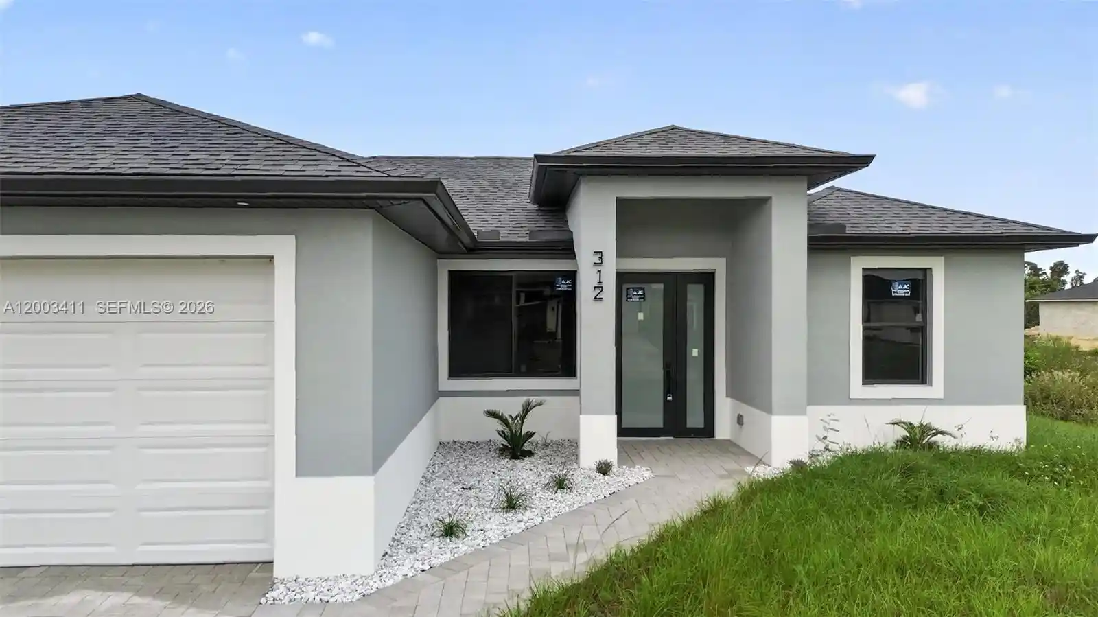 Photo 1 of Single family home for sale at 312 Rand Ave, Lehigh Acres, FL 33974 | MLS# A12003411 | Listing updated on 2026-10-20