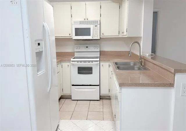 1st image of 9491 S Palm Cir #S 103, Pembroke Pines, FL 33025 | MLS# A12000953