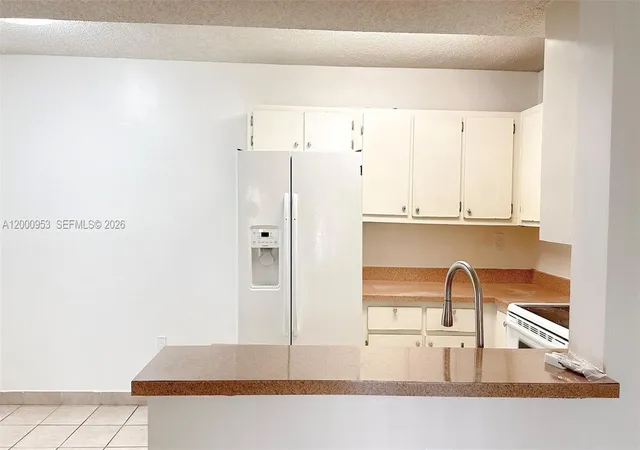 4th image of 9491 S Palm Cir #S 103, Pembroke Pines, FL 33025 | MLS# A12000953