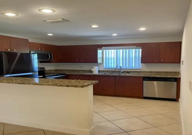 3rd image of 1971 Juno Rd, North Palm Beach, FL 33408 | MLS# B26018530
