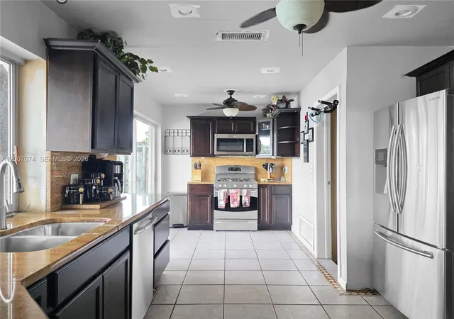 1st image of 11661 Nw 31st Pl, Sunrise, FL 33323 | MLS# A12007074