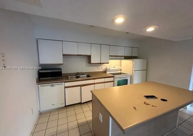 Homes for sale in Pompano Beach, FL | 3985 W Mcnab Rd, Pompano Beach, FL 33069