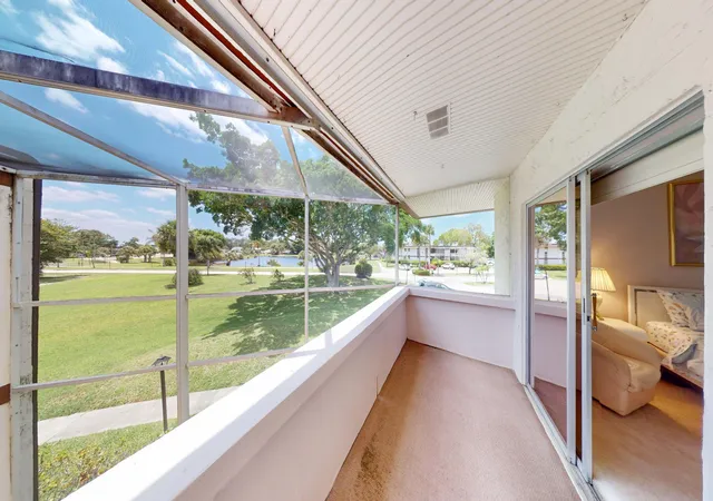 Listing Photo 5 - Condo for sale in building located at 3 Greenway Vlg N, Royal Palm Beach, FL 33411 - Unit #210