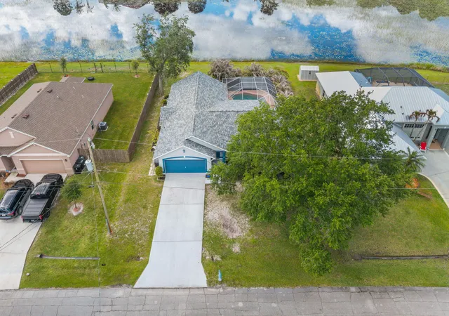 2nd image of 5930 Nw Theda Ln, Port St Lucie, FL 34983 | MLS# B26020635