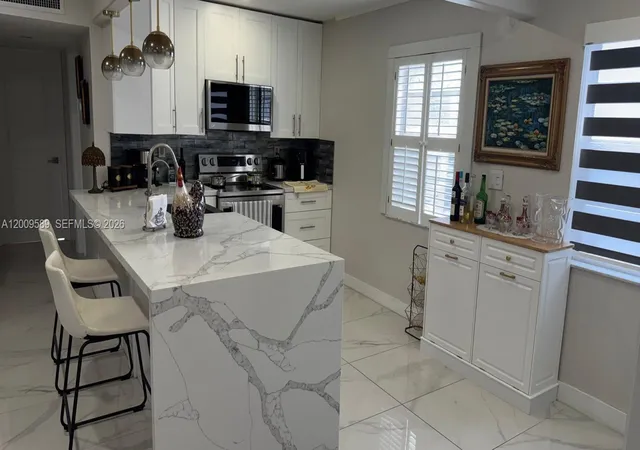 1st image of 31 Normandy A #A, Delray Beach, FL 33484 | MLS# A12009589