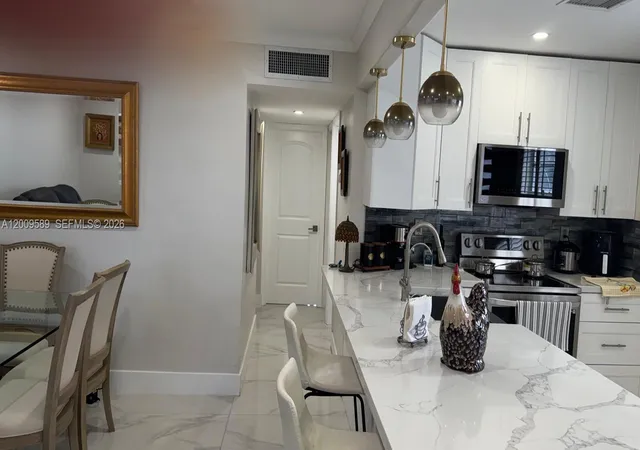 2nd image of 31 Normandy A #A, Delray Beach, FL 33484 | MLS# A12009589