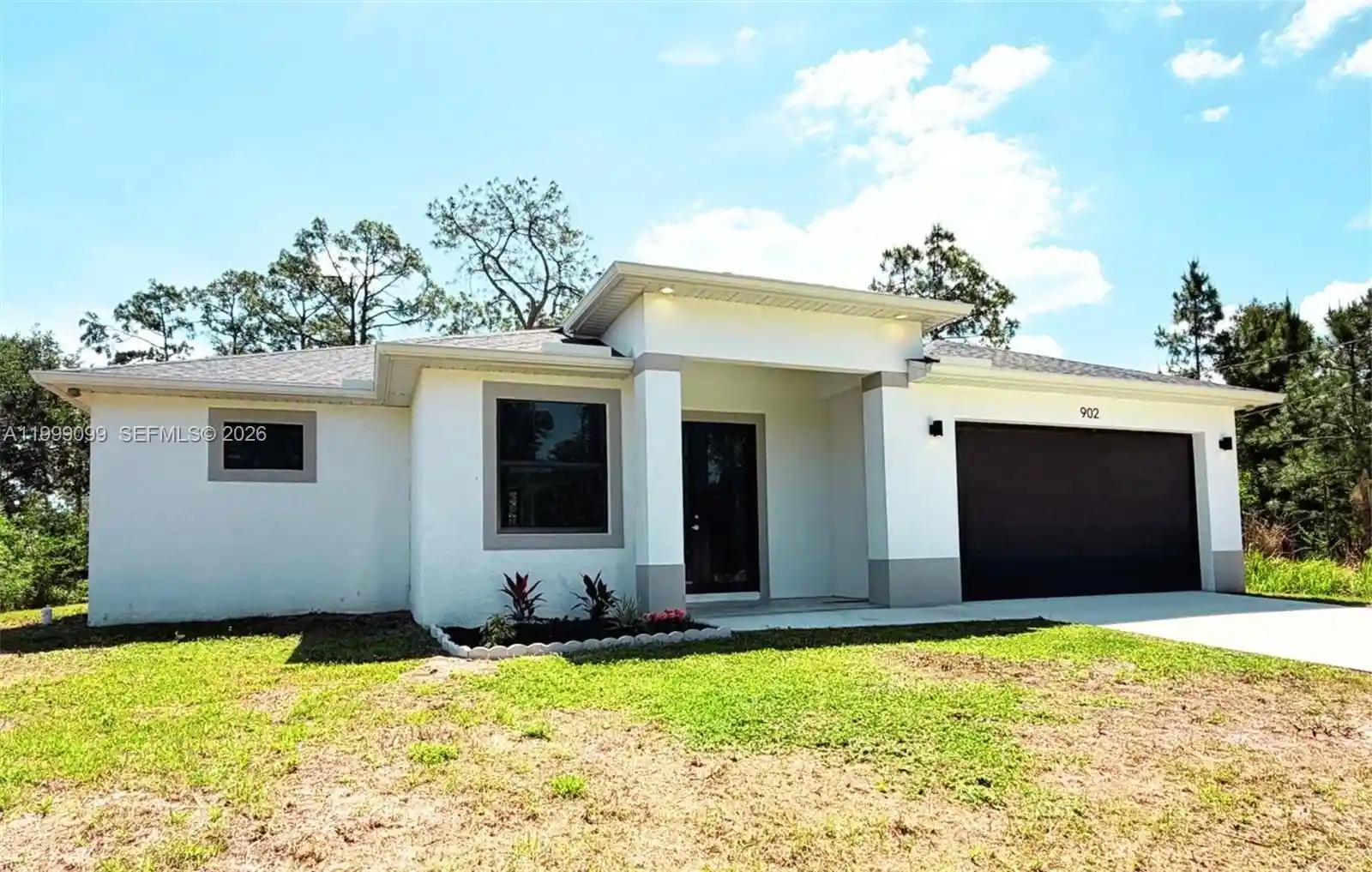 Photo 1 of Single family home for sale at 902 Magnolia Ave, Lehigh Acres, FL 33972 | MLS# A11999099 | Listing updated on 2026-10-25