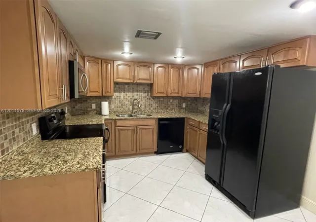 5th image of 491 Racquet Clb Rd, Weston, FL 33326