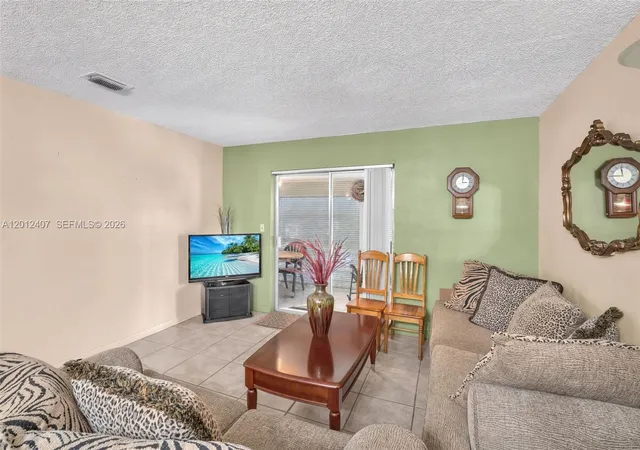 Listing Photo 1 - Condo for sale in building located at 16901 Ne 13Th Ave, Miami, FL 33162 - Unit #303