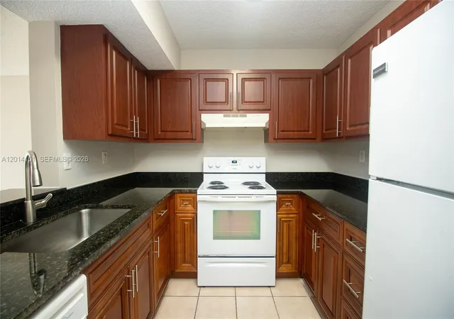 1st image of 9491 S Palm Cir, Pembroke Pines, FL 33025