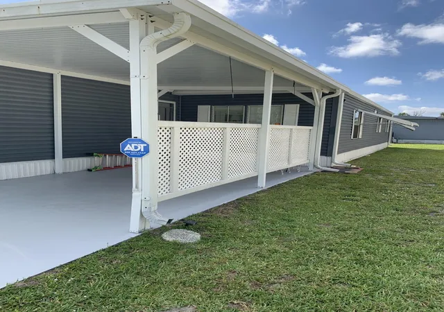 Photo 3 of Manufactured home for sale at 22 Cozumel Ln, Port Saint Lucie, FL 34952 | MLS# B26025997 | Listing updated on 2026-09-23