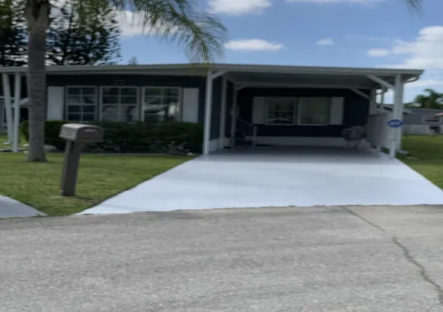 Photo 3 of Manufactured home for sale at 22 Cozumel Ln, Port Saint Lucie, FL 34952 | MLS# B26025997 | Listing updated on 2026-09-23