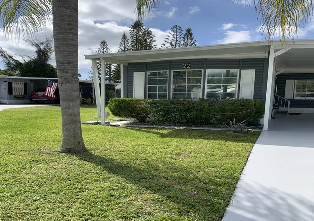 Photo 4 of Manufactured home for sale at 22 Cozumel Ln, Port Saint Lucie, FL 34952 | MLS# B26025997 | Listing updated on 2026-09-23