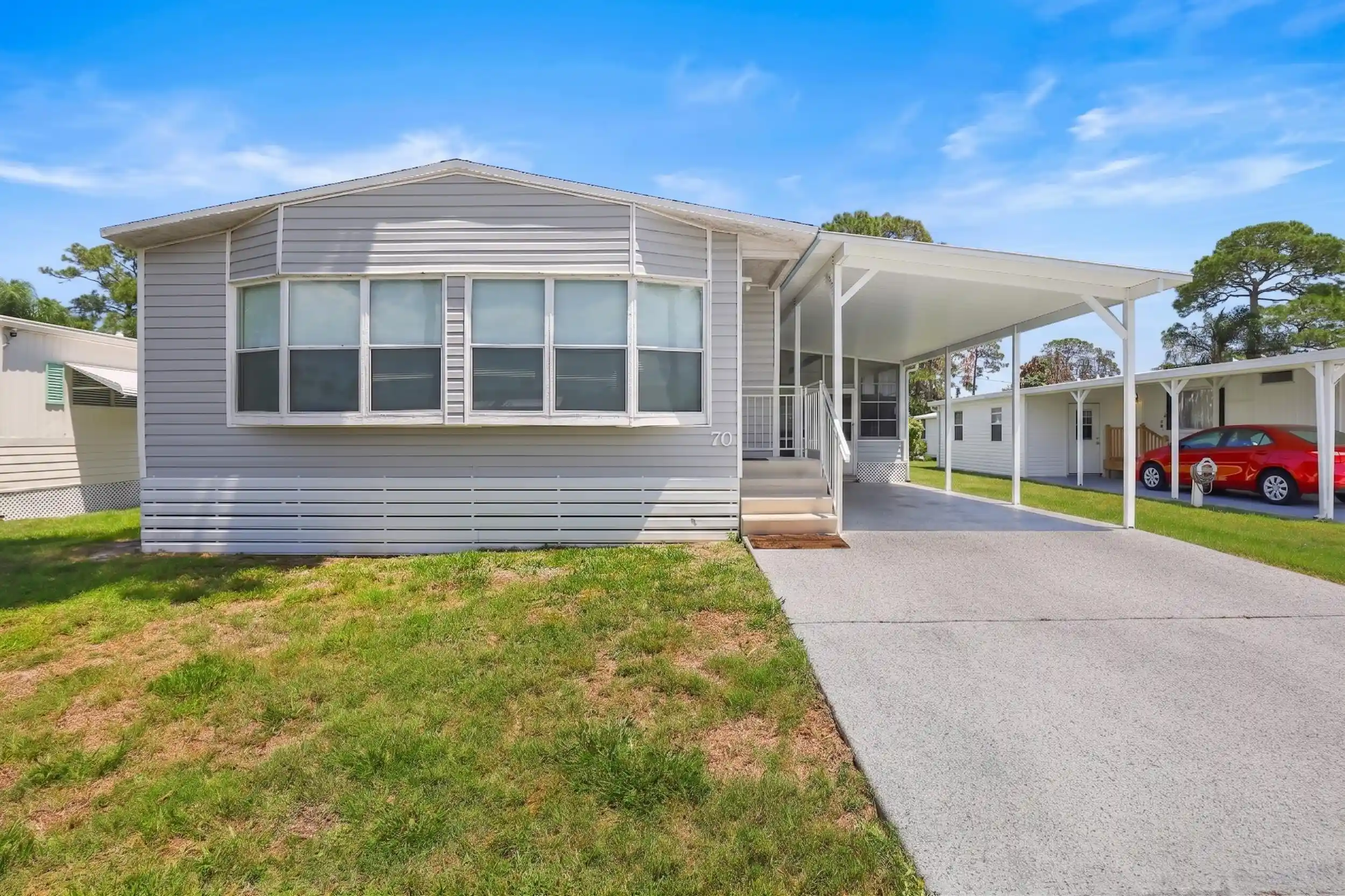 Photo 1 of Manufactured home for sale at 70 Golf Dr, Port Saint Lucie, FL 34952 | MLS# B26027306 | Listing updated on 2026-10-23