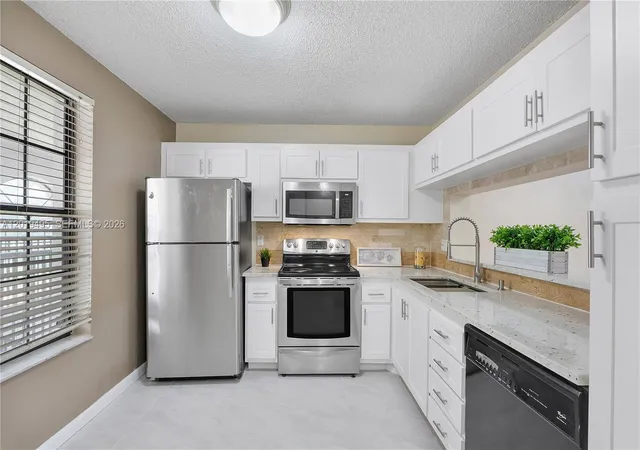 1st image of 2382 Nw 89th Dr #2382, Coral Springs, FL 33065 | MLS# A12019495