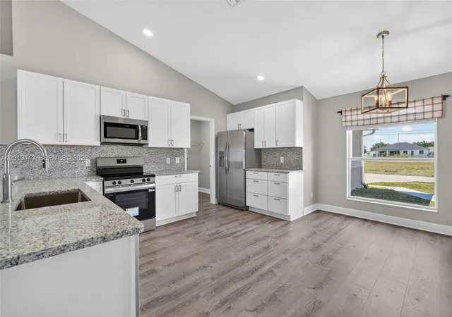 Homes for sale in Cape Coral, FL | 409 Ne 25th Ter, Cape Coral, FL 33909 | MLS# A12019440