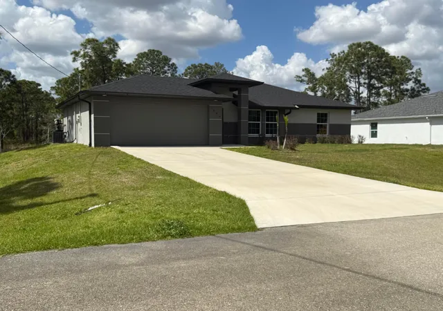 1st image of 1046 S Cheney Ave Ave S, Lehigh Acres, FL 33974 | MLS# B26030289