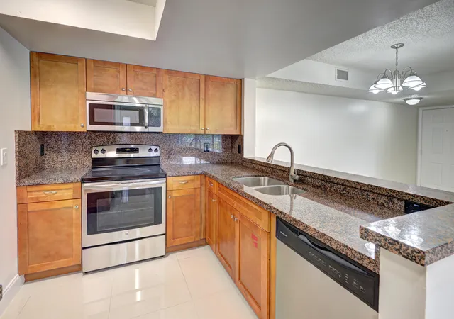 Photo 2 of Condo for sale at 9244 W Atlantic Blvd #1222, Coral Springs, FL 33071 | MLS# B26030661 | Listing updated on 2026-09-09