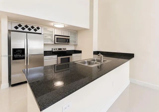 3rd image of 1871 S River Dr #A04, Miami, FL 33125 | MLS# A12022449