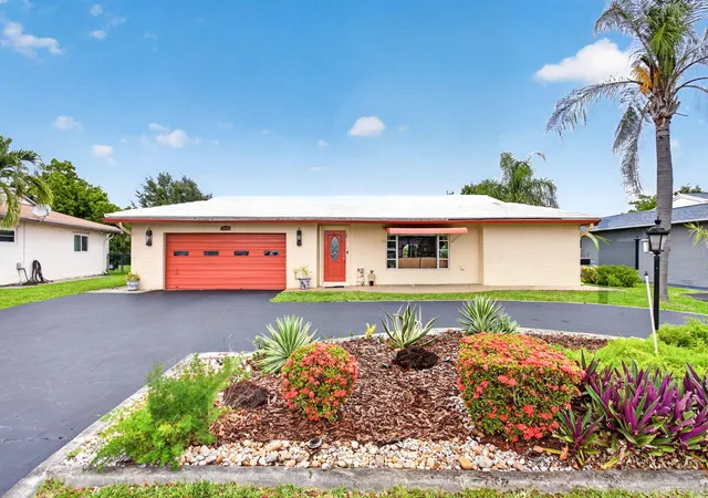 Photo 1 of Single family home for sale at 7306 Nw 94th Way, Tamarac, FL 33321 | MLS# B26031202 | Listing updated on 2026-06-13