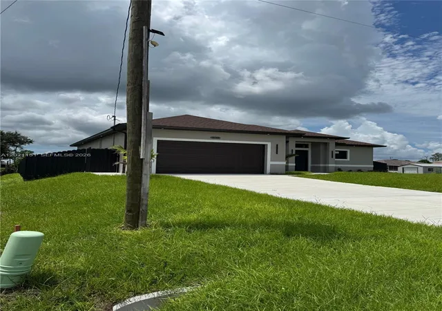 2nd image of 3115 2nd St Sw, Lehigh Acres, FL 33976 | MLS# A12021151