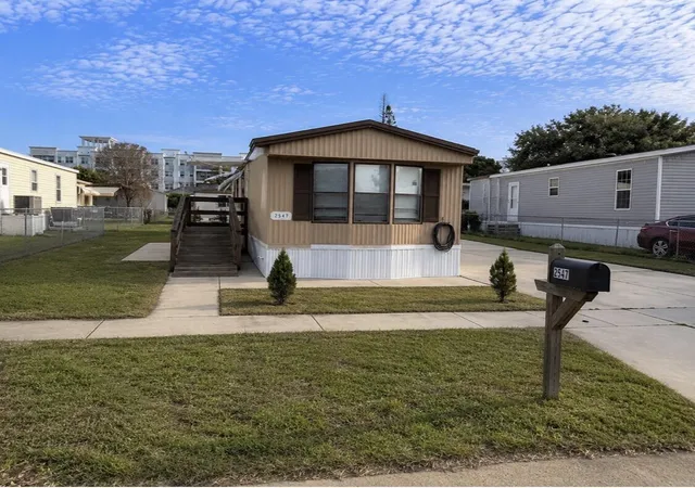 Photo 1 of Manufactured home for sale at 2547 Chatham Way Ne, Palm Bay, FL 32905 | MLS# B26032302 | Listing updated on 2026-09-26