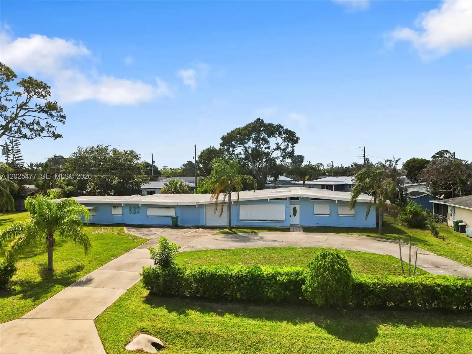Photo 1 of Single family home for sale at 310 E Olive Ave, Port St Lucie, FL 34952 | MLS# A12025477 | Listing updated on 2026-10-30