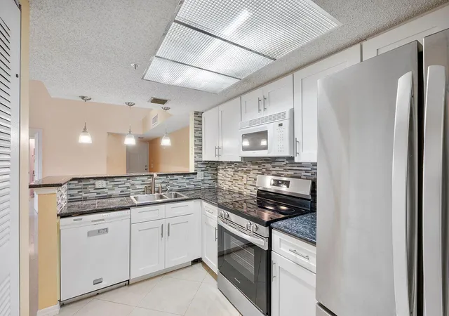1st image of 5011 Wiles Rd #Unit 303, Coconut Creek, FL 33073 | MLS# B26035654