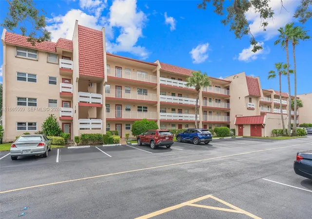 Listing Photo 1 - Condo for sale in building located at 1015 Country Clb Dr, Titusville, FL 33063 - Unit #307