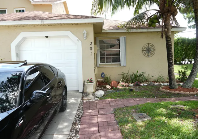 Photo 1 of Single family home for sale at 201 Maplewood Dr #201, Greenacres, FL 33415 | MLS# B26036036 | Listing updated on 2026-09-23
