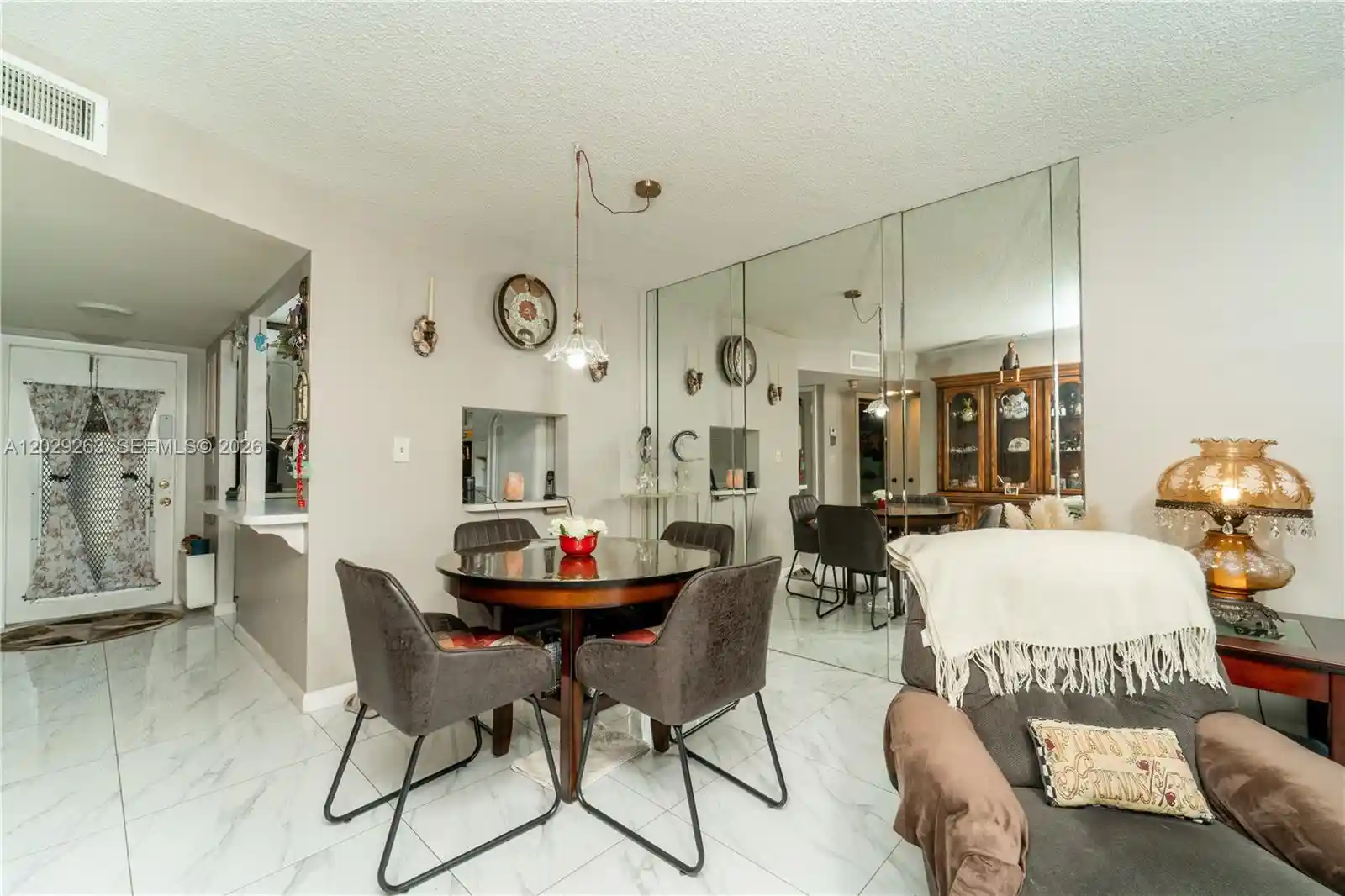 Listing Photo 1 - Condo for sale in 2811 N Pine Island Rd located at 2811 N Pine Island Rd, Sunrise, FL 33322 - Unit #102