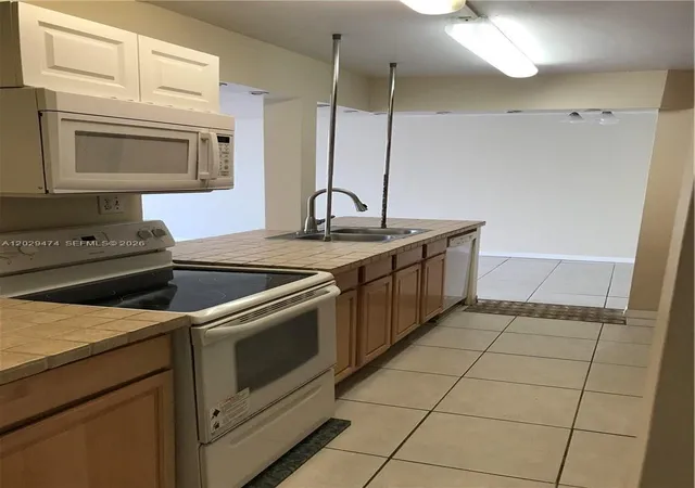3rd image of 7081 Environ Blvd, Lauderhill, FL 33319