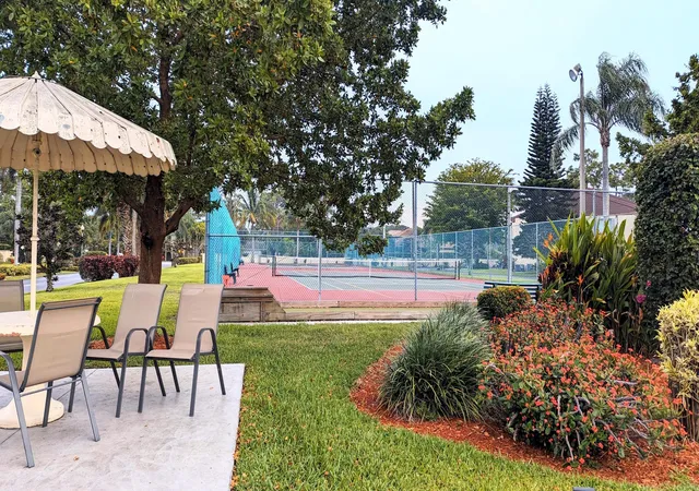 22nd image of 319 Knotty Pine Cir #C-1, Greenacres, FL 33463 | MLS# B26037385