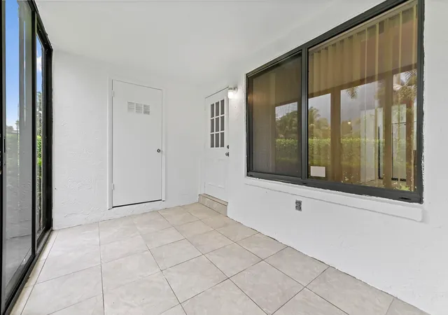 3rd image of 319 Knotty Pine Cir #C-1, Greenacres, FL 33463 | MLS# B26037385