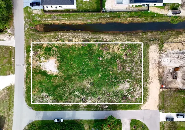 1st image of 0 4th St W, Lehigh Acres, FL 33971 | MLS# A12032241