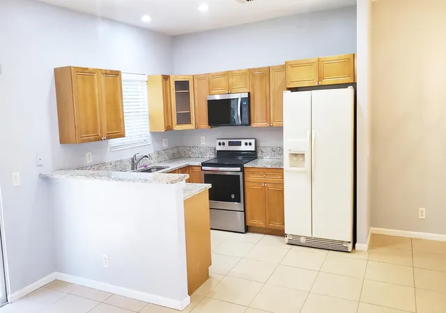 Photo 3 of Townhouse for sale at 132 Baldwin Blvd, Greenacres, FL 33463 | MLS# B26037841 | Listing updated on 2026-09-28
