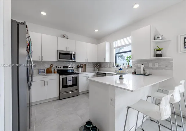 Townhouse for sale at 561 NW 204th Street, Miami, FL 33169 | MLS# A12032501 | Listing updated on 2026-07-06