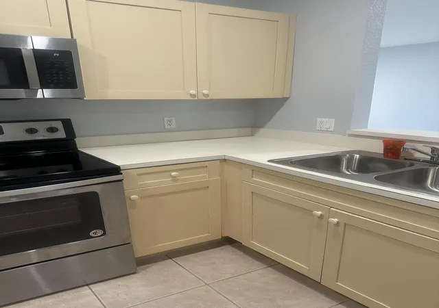 2nd image of 1049 Golden Lakes Blvd, West Palm Beach, FL 33411