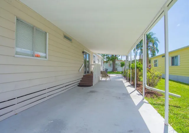 Photo 3 of Manufactured home for sale at 78 W Caribbean, Port Saint Lucie, FL 34952 | MLS# B26038560 | Listing updated on 2026-09-23
