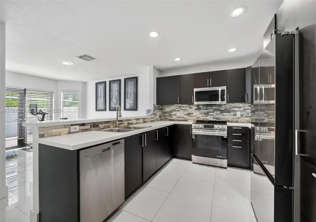 Homes for sale in Fort Lauderdale, FL | 448 Nw 15Th Wy, Fort Lauderdale, FL 33311 | MLS# A12033270